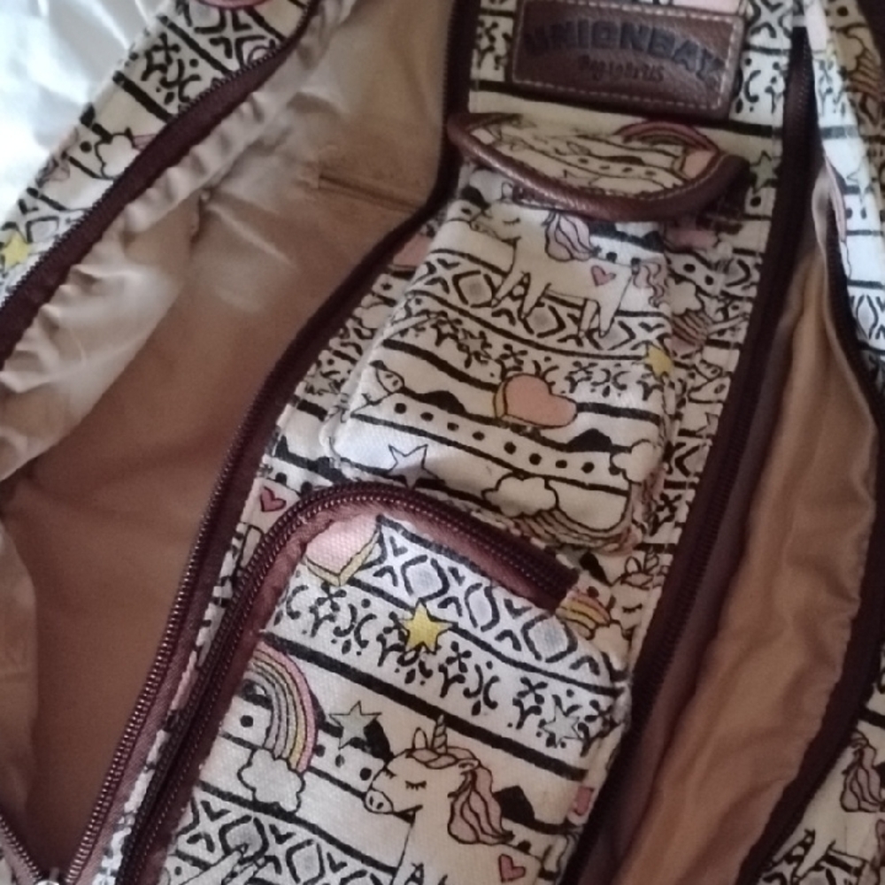 Unionbay Patterned Backpack With Brown Accents - image 7